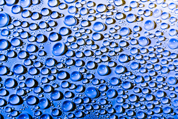 蓝色海报水滴背景图图片