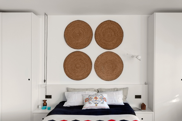 现代卧室褐色圆点背景墙室内装修效果图