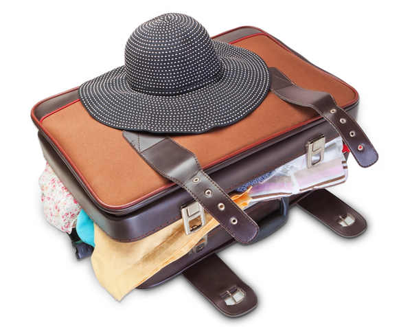 行李箱与遮阳帽图片