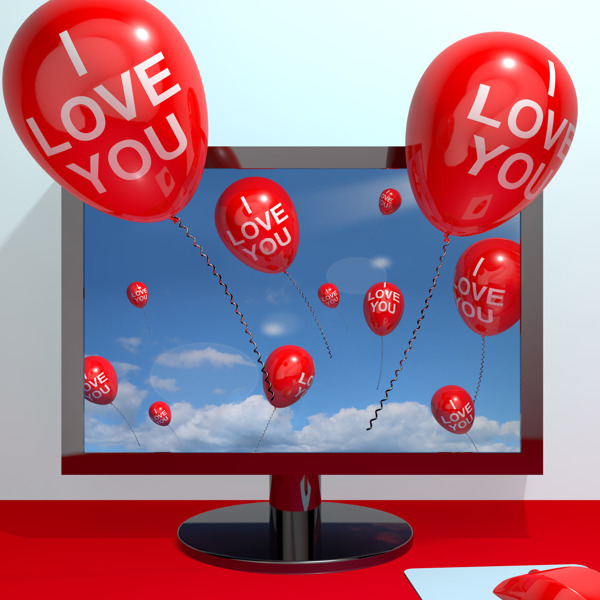 我爱你从计算机屏幕显示爱和在线约会的气球